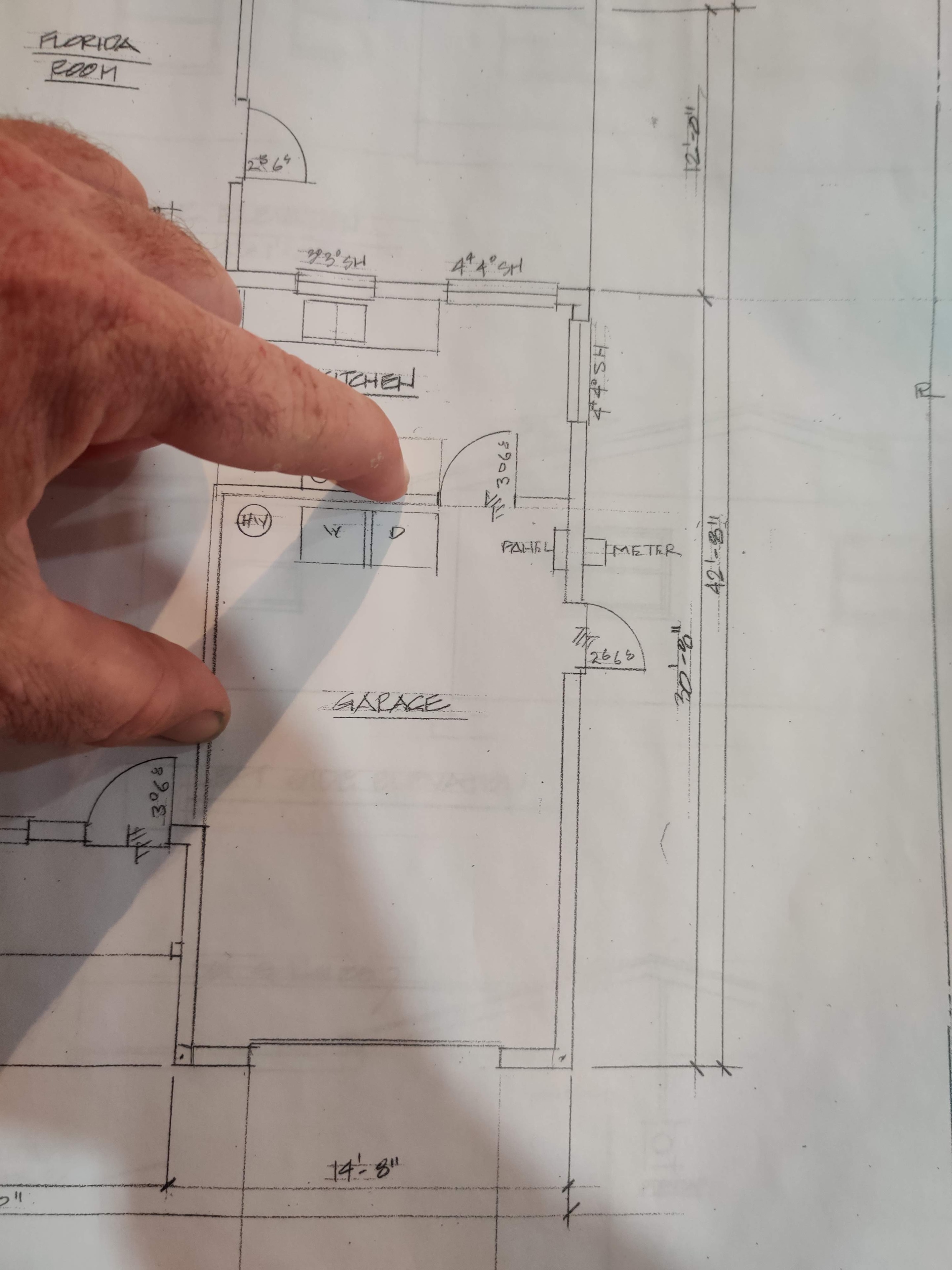 Proposed new main level floor plan for the Gilley Residence showing the full layout: family room, kitchen, bar, master suite, 2-car garage, and more.